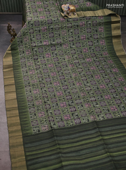 Semi matka saree green and bottle green with allover patola prints and zari woven border
