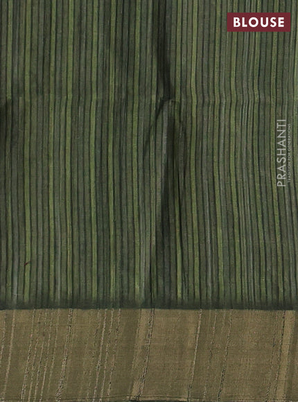 Semi matka saree green and bottle green with allover patola prints and zari woven border