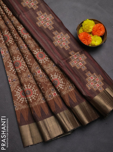 Semi matka saree dark mustard and coffee brown with allover patola prints and zari woven border