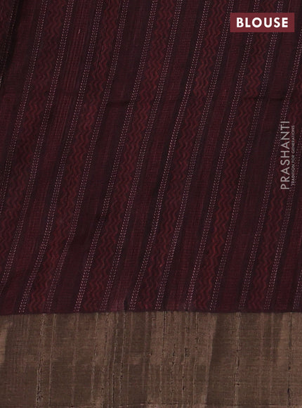 Semi matka saree maroon and coffee brown with allover patola prints and zari woven border