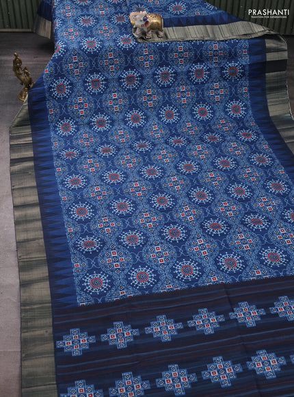 Semi matka saree peacock blue with allover patola prints and zari woven border