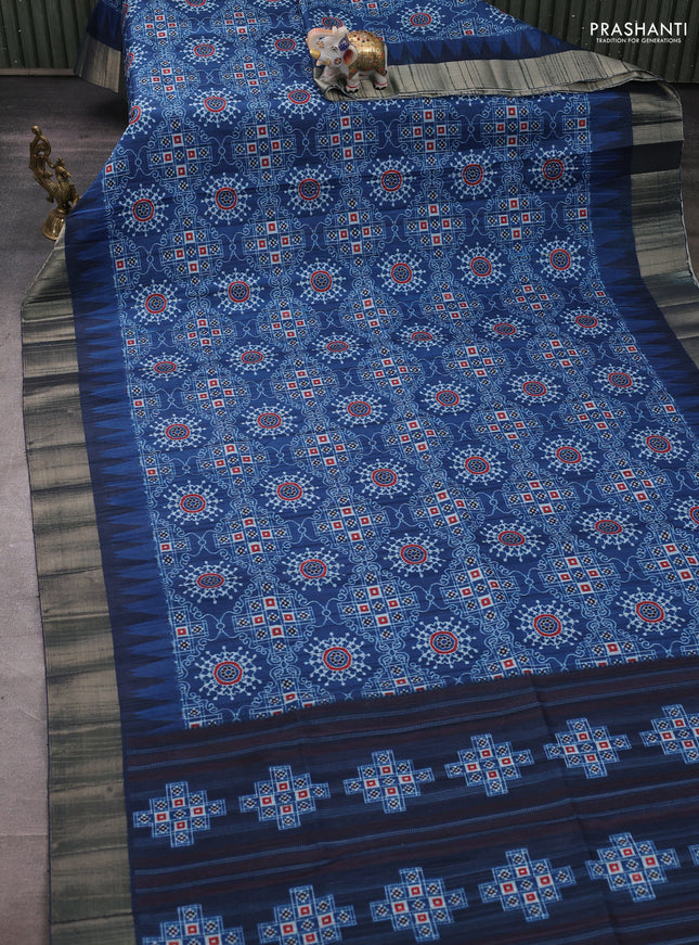 Semi matka saree peacock blue with allover patola prints and zari woven border