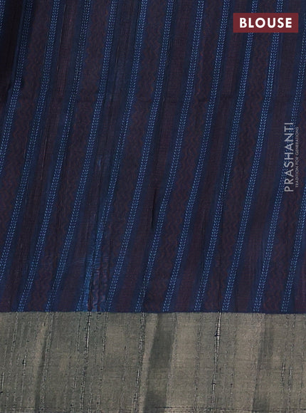 Semi matka saree peacock blue with allover patola prints and zari woven border