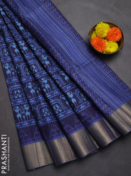Semi matka saree blue with allover patola prints and zari woven border