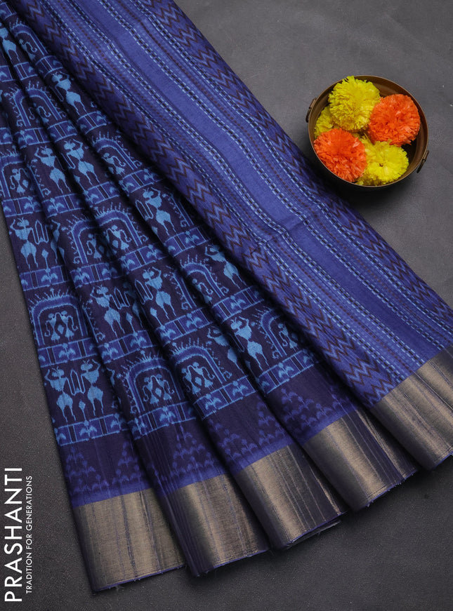 Semi matka saree blue with allover patola prints and zari woven border