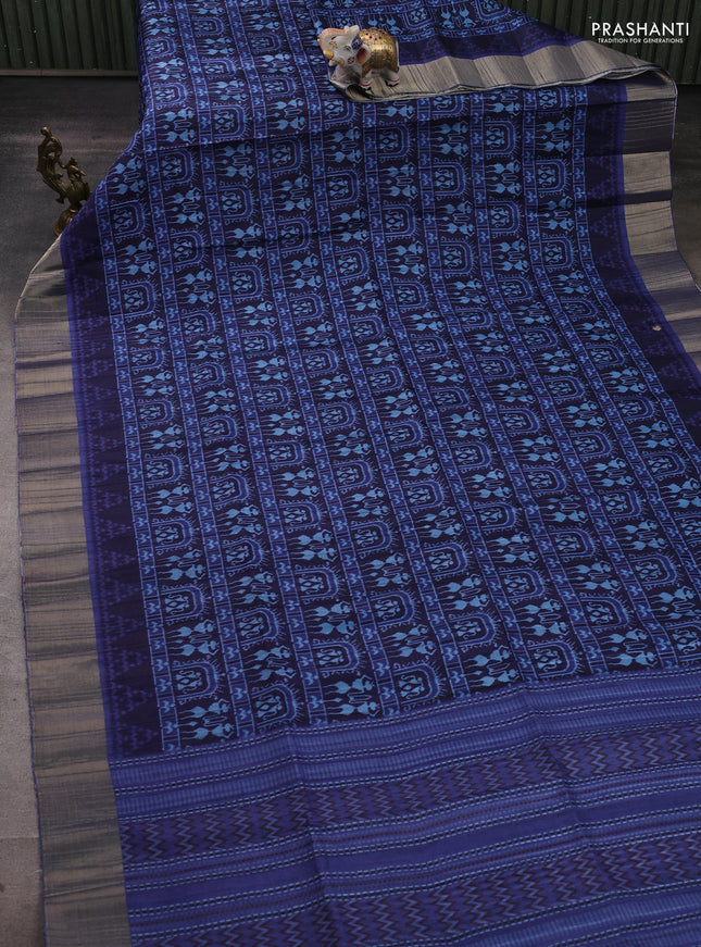 Semi matka saree blue with allover patola prints and zari woven border