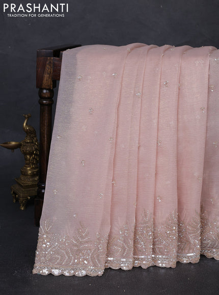 Crush tissue silk saree mild peach with sequin embroidery work