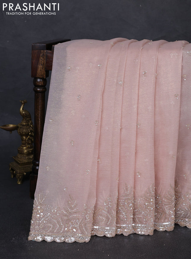 Crush tissue silk saree mild peach with sequin embroidery work