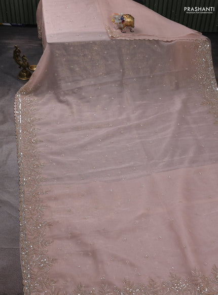Crush tissue silk saree mild peach with sequin embroidery work