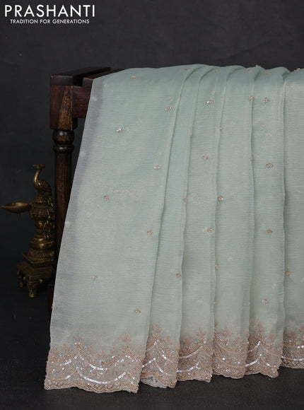 Crush tissue silk saree mild teal with cut beads & sequin embroidery work