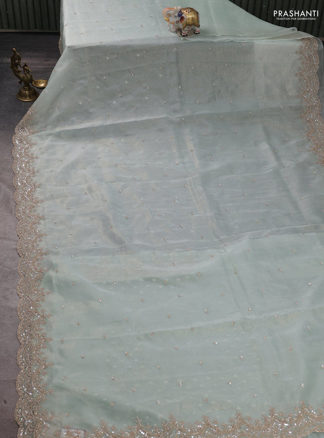 Crush tissue silk saree mild teal with cut beads & sequin embroidery work