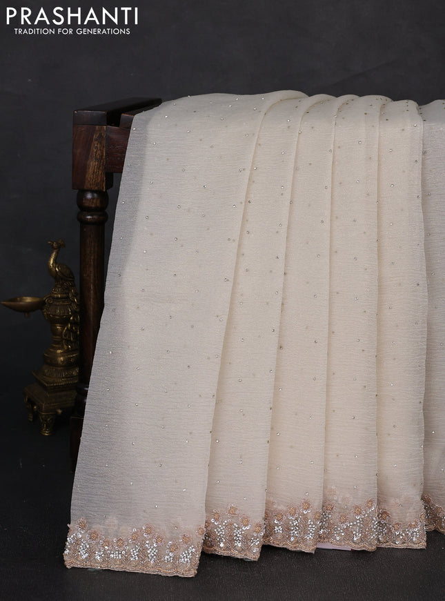 Crush tissue silk saree cream with stone & sequin embroidery work