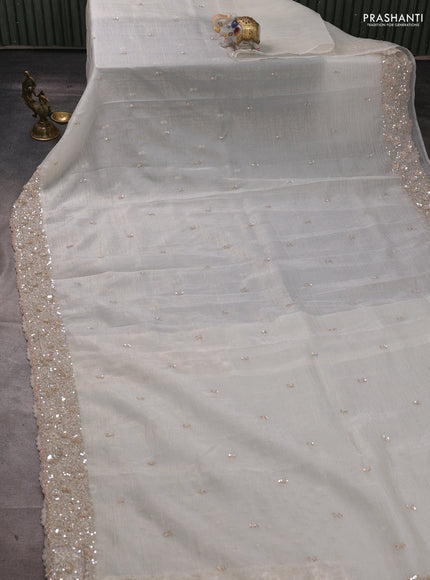 Crush tissue silk saree cream with cut beads & sequin embroidery work