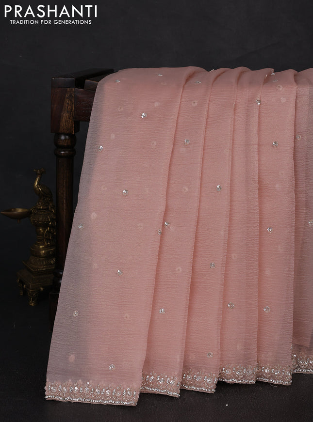Crush tissue silk saree peach shade with cut beads & sequin embroidery work