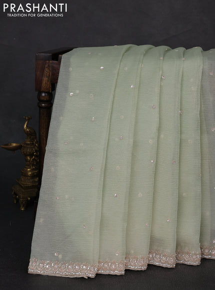 Crush tissue silk saree pista green with cut beads & sequin embroidery work