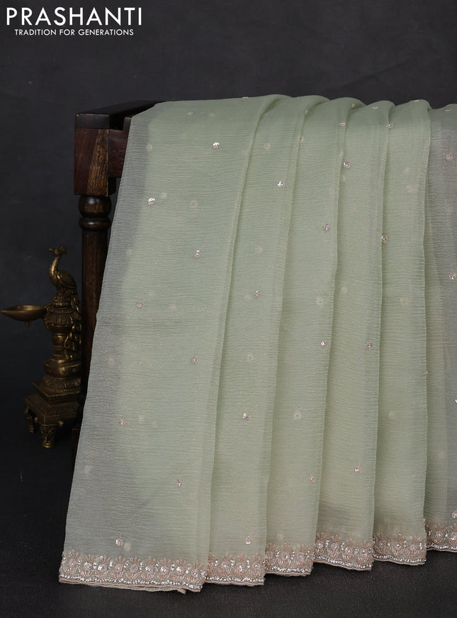Crush tissue silk saree pista green with cut beads & sequin embroidery work