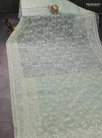 Organza Saree pista green with allover embroidery work
