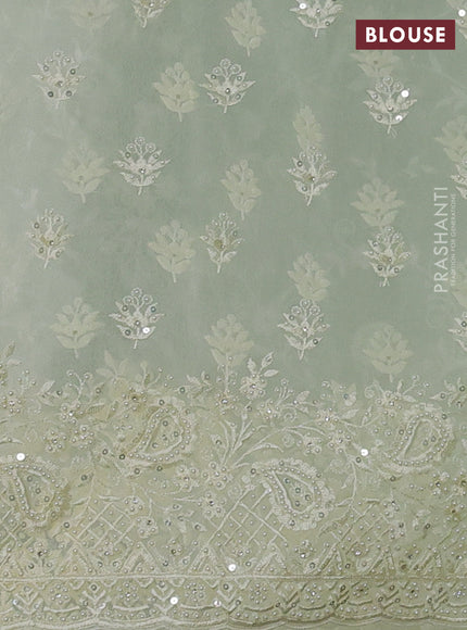 Organza Saree pista green with allover embroidery work