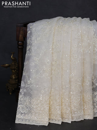 Organza Saree off white with allover embroidery work