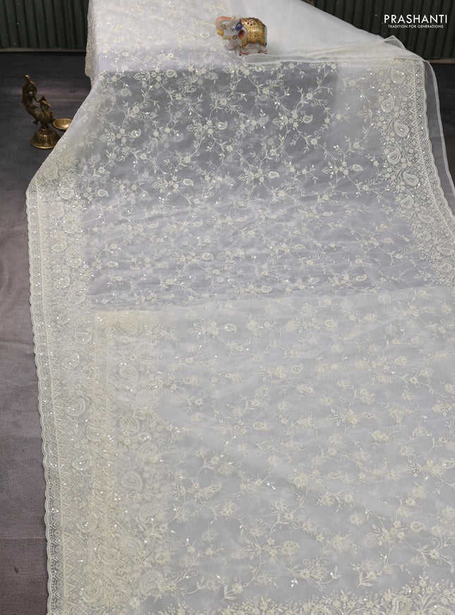 Organza Saree off white with allover embroidery work
