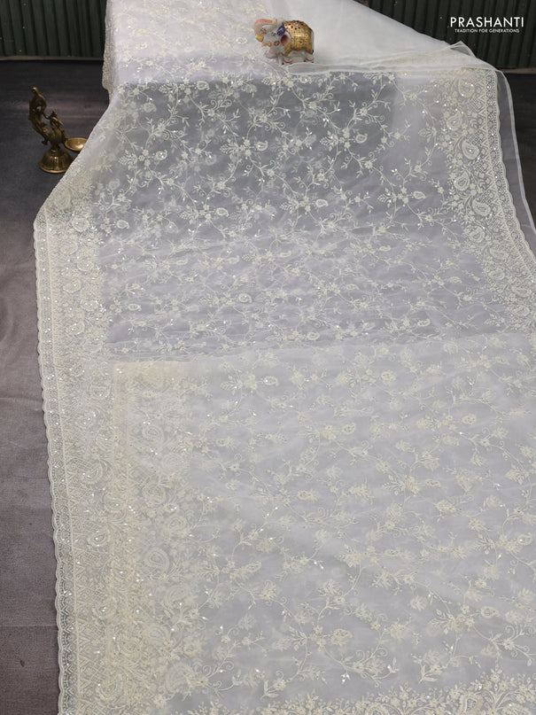 Organza Saree off white with allover embroidery work