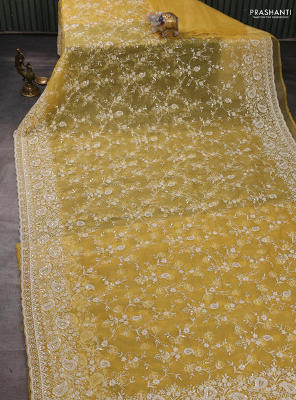 Organza Saree yellow with allover embroidery work