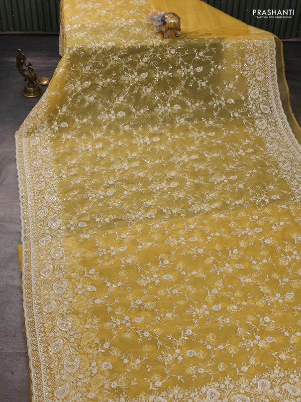 Organza Saree yellow with allover embroidery work