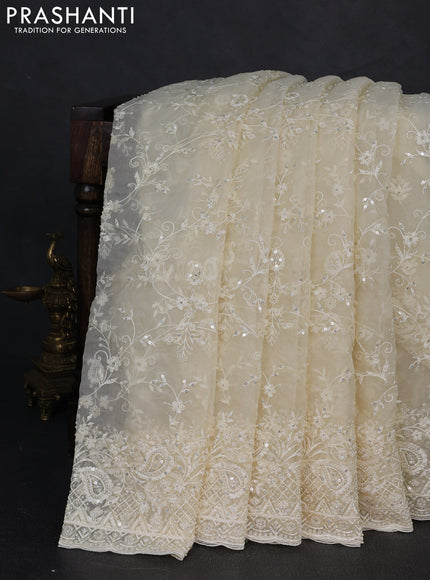 Organza Saree cream with allover embroidery work