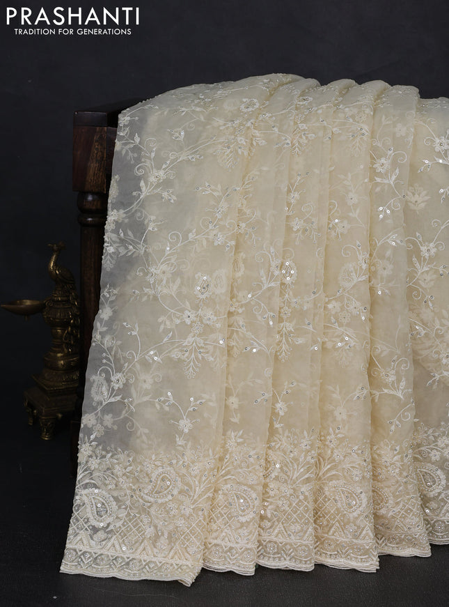 Organza Saree cream with allover embroidery work