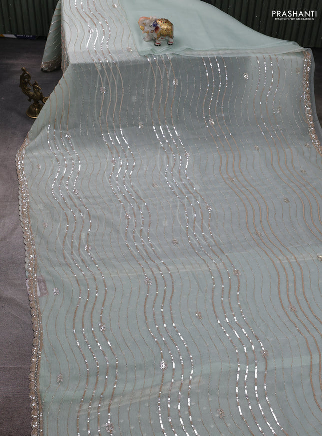 Crush tissue silk saree pastel green with allover sequin embroidery work