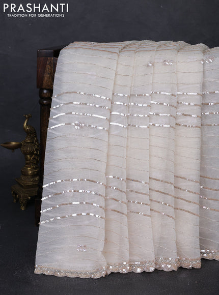 Crush tissue silk saree off white with allover sequin embroidery work