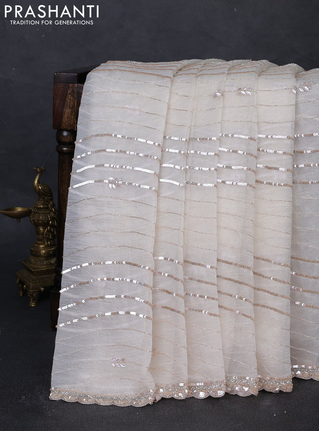 Crush tissue silk saree off white with allover sequin embroidery work