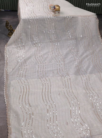 Crush tissue silk saree off white with allover sequin embroidery work
