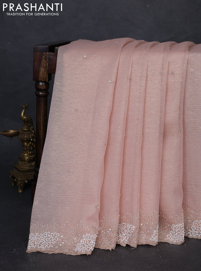 Crush tissue silk saree mild peach with cut beaded embroidery work
