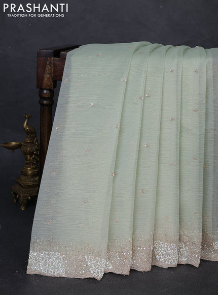 Crush tissue silk saree pista green with cut beaded embroidery work