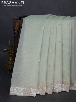 Crush tissue silk saree pista green with cut beaded embroidery work