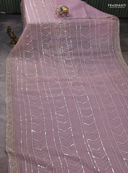 Organza saree pastel pink with allover cut beads & sequin embroidery work