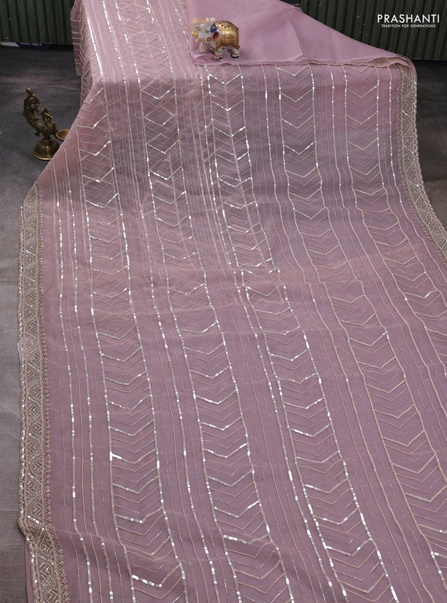 Organza saree pastel pink with allover cut beads & sequin embroidery work