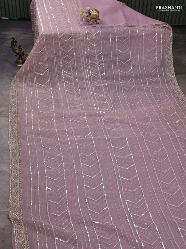 Organza saree pastel pink with allover cut beads & sequin embroidery work