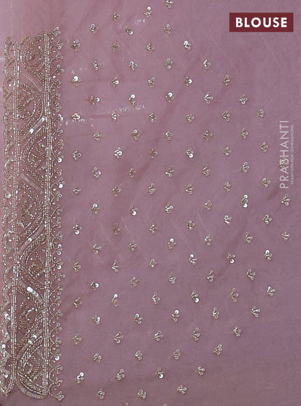 Organza saree pastel pink with allover cut beads & sequin embroidery work