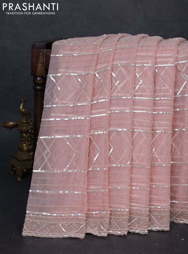 Organza saree mild peach with allover cut beads & sequin embroidery work