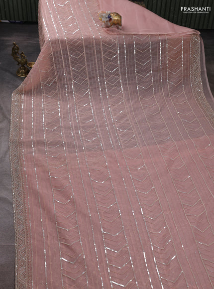 Organza saree mild peach with allover cut beads & sequin embroidery work