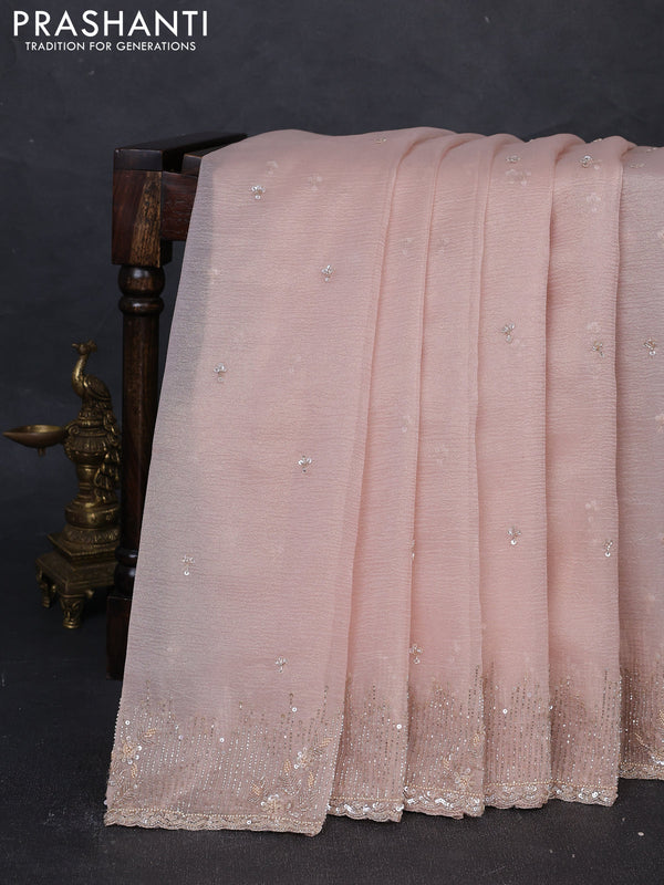 Crush tissue silk saree mild peach with cut beads & sequin embroidery work
