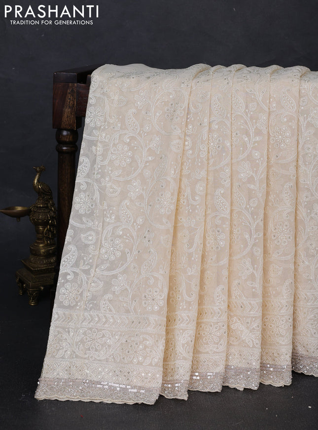 Georgeette saree cream with allover cut beads & sequin embroidery work