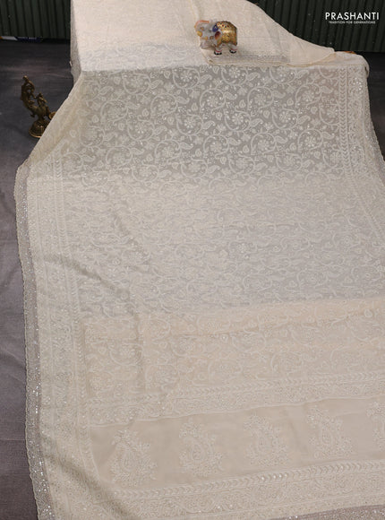 Georgeette saree cream with allover cut beads & sequin embroidery work