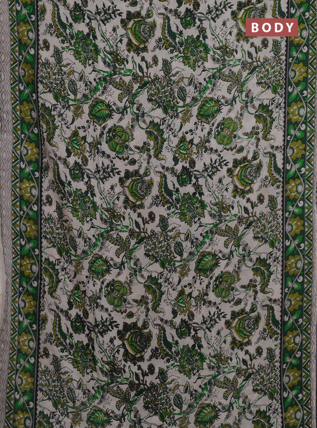 Kalamkari semi silk saree beige and green with allover prints and printed border
