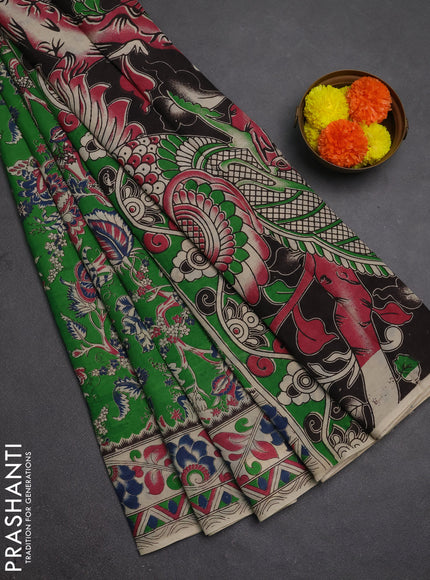Kalamkari semi silk saree light green and beige with allover prints and printed border