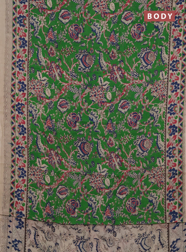 Kalamkari semi silk saree light green and beige with allover prints and printed border