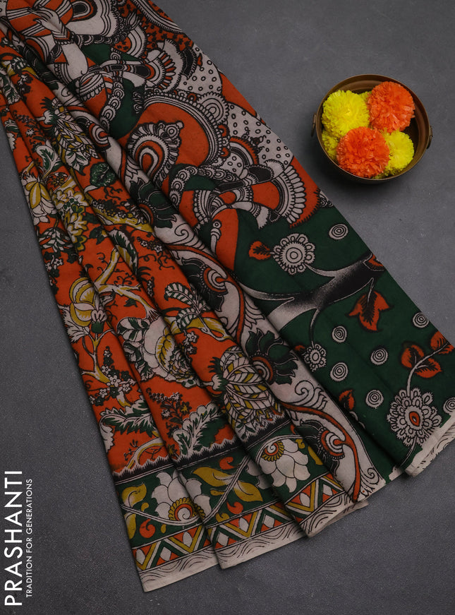Kalamkari semi silk saree orange and green with allover prints and printed border