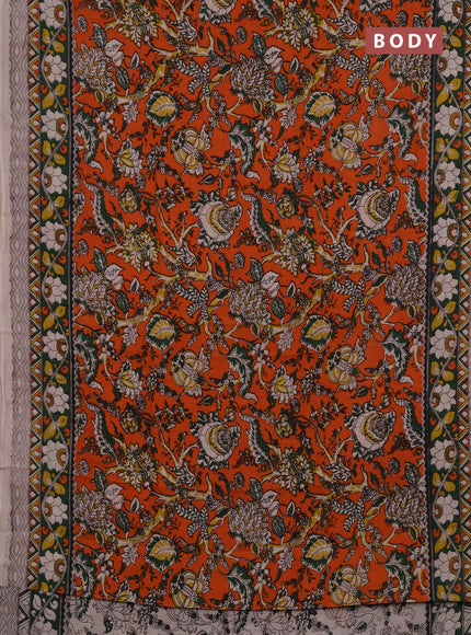 Kalamkari semi silk saree orange and green with allover prints and printed border